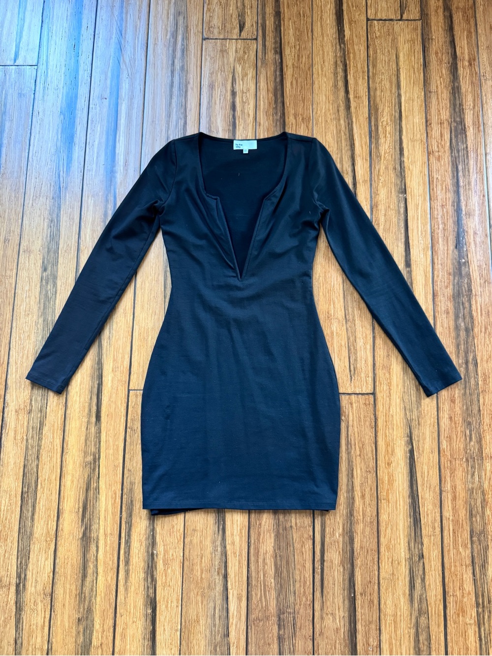by the way. Black Long-Sleeve V-Neck Bodycon Dress